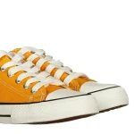 Tenisi dama Yumia galbeni